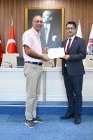 Rektör Erenoğlu’ndan ÇOMÜ’lü Akademisyenlere Teşekkür Belgesi Takdimi Yapıldı fotoğraf 13